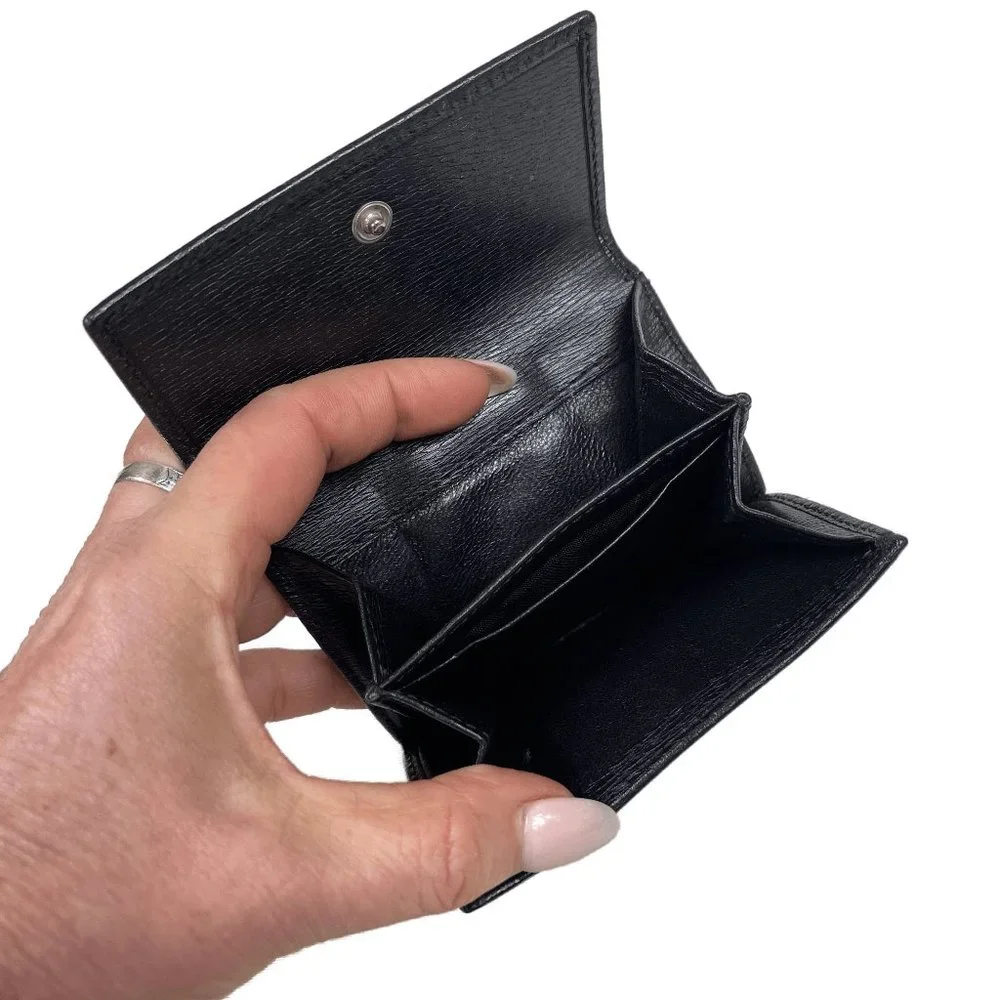 Auc Gucci Snappy Bi-fold GG vintage leather wallet